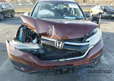 2015 Honda Cr-V Lx z USA, uszkodzony, nr VIN 2HKRM4H36FH702112